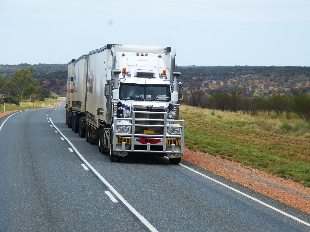 Logistics semi-trailer truck on a road